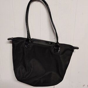 A black Longchamp Le Pillage tote bag